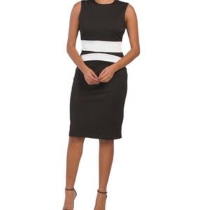 Brand: Alexia admor, size: L, black dress with white waist lines.